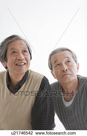 Two Senior Men Looking Up View Large Photo Image Stock Image - Two Senior Men Looking Up. Fotosearch