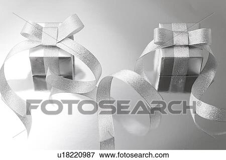 Two Silver Gifts View Large Photo Image Stock Photo - Two Silver Gifts. Fotosearch