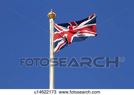 Stock Image - Union Jack Against Blue Sky. Fotosearch