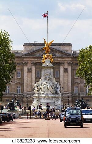 Stock Image - Victoria Monument and Buckingham Palace. Fotosearch