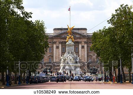 Stock Photo - Victoria Monument and Buckingham Palace. Fotosearch