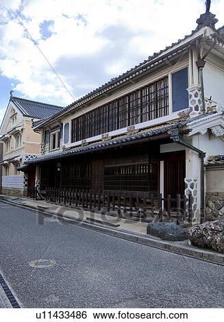Stock Photograph - White Wall Storehouses in Ehime Prefecture, Japan. Fotosearch