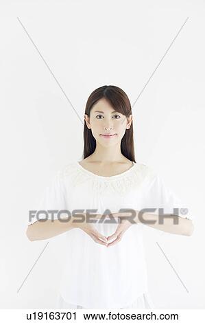 Woman Forming Love Heart With Fingers View Large Photo Image Stock Image - Woman Forming Love Heart With Fingers. Fotosearch