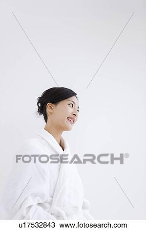 Stock Image - Woman in bathrobe. Fotosearch