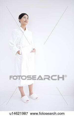 Woman in bathrobe View Large Photo Image Stock Photo - Woman in bathrobe. Fotosearch