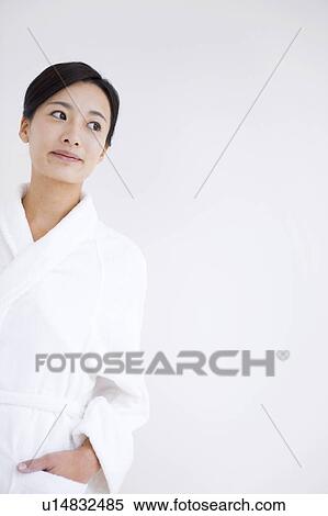 Woman in bathrobe View Large Photo Image Stock Photography - Woman in bathrobe. Fotosearch