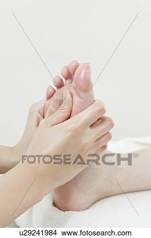 Picture - Woman Receiving Foot Massage. Fotosearch