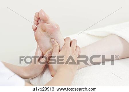 Woman Receiving Foot Massage View Large Photo Image Stock Image - Woman Receiving Foot Massage. Fotosearch