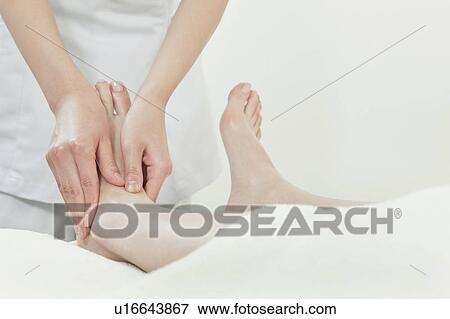 Woman Receiving Foot Massage View Large Photo Image Stock Photo - Woman Receiving Foot Massage. Fotosearch