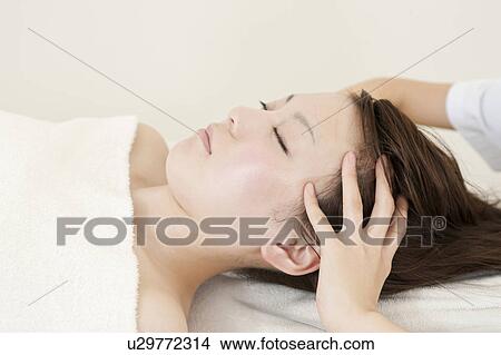 Woman Receiving Head Massage View Large Photo Image Picture - Woman Receiving Head Massage. Fotosearch