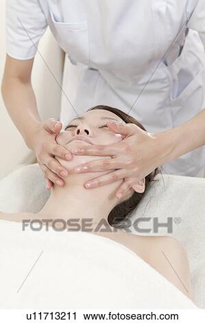 Woman Receiving Head Massage View Large Photo Image Stock Image - Woman Receiving Head Massage. Fotosearch