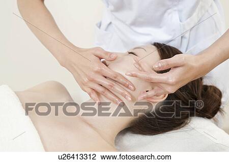 Woman Receiving Head Massage View Large Photo Image Stock Image - Woman Receiving Head Massage. Fotosearch