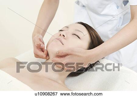 Woman Receiving Head Massage View Large Photo Image Stock Photo - Woman Receiving Head Massage. Fotosearch