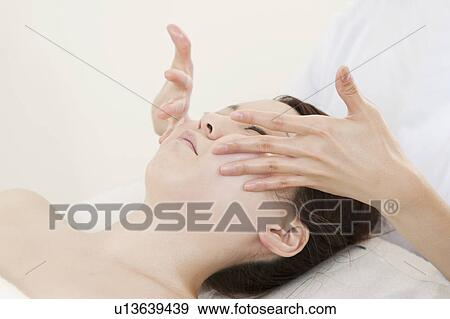 Woman Receiving Head Massage View Large Photo Image Stock Photo - Woman Receiving Head Massage. Fotosearch