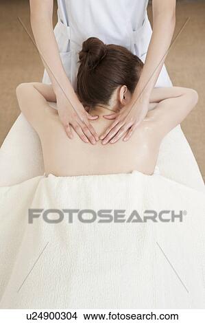 Woman Receiving Massage View Large Photo Image Picture - Woman Receiving Massage. Fotosearch