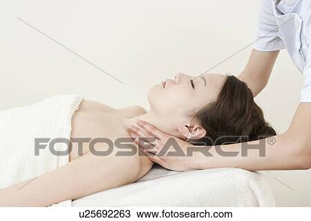 Woman Receiving Massage View Large Photo Image Stock Image - Woman Receiving Massage. Fotosearch