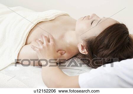 Stock Photograph - Woman Receiving Massage. Fotosearch