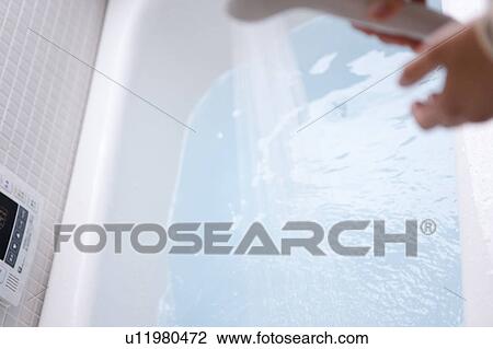 Woman Showering Water to Bathtub View Large Photo Image Stock Image - Woman Showering Water to Bathtub. Fotosearch