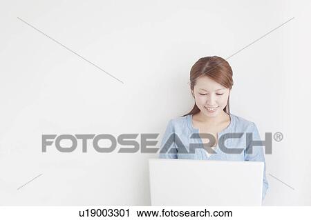 Woman Using Laptop View Large Photo Image Stock Image - Woman Using Laptop. Fotosearch