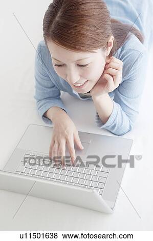 Woman Using Laptop View Large Photo Image Stock Photo - Woman Using Laptop. Fotosearch