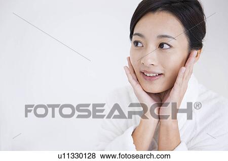 Woman with head in hands View Large Photo Image Stock Photo - Woman with head in hands. Fotosearch