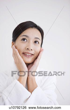 Woman with head in hands View Large Photo Image Stock Photograph - Woman with head in hands. Fotosearch