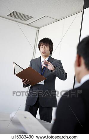 Young Businessman Giving Presentation View Large Photo Image Stock Image - Young Businessman Giving Presentation. Fotosearch