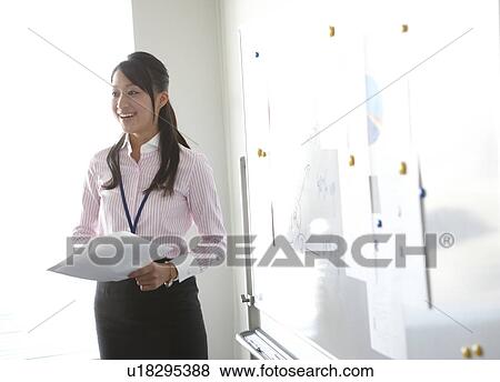 Young Businesswoman Giving Presentation View Large Photo Image Stock Photo - Young Businesswoman Giving Presentation. Fotosearch