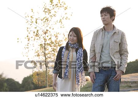 Young Couple at Dusk View Large Photo Image Stock Photography - Young Couple at Dusk. Fotosearch