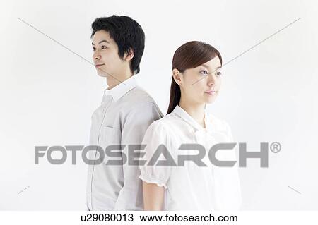 Young Couple Back to Back View Large Photo Image Stock Image - Young Couple Back to Back. Fotosearch