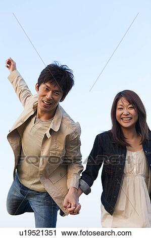 Young Couple Running View Large Photo Image Stock Image - Young Couple Running. Fotosearch