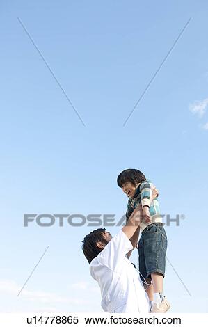 Stock Photography - Young Male Doctor and Child. Fotosearch