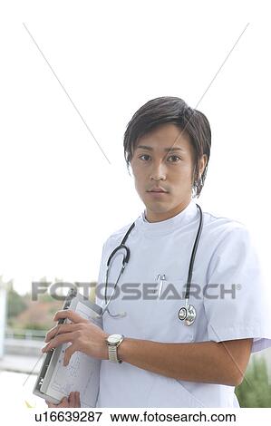 Young Male Doctor View Large Photo Image Stock Photo - Young Male Doctor. Fotosearch