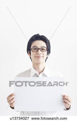 Young Man Holding Blank Message View Large Photo Image Stock Photo - Young Man Holding Blank Message. Fotosearch
