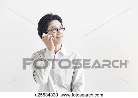 Young Man on Phone View Large Photo Image Stock Image - Young Man on Phone. Fotosearch
