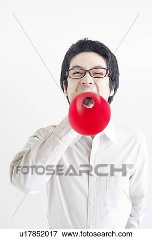 Stock Photo - Young Man Shouting To Megaphone. Fotosearch