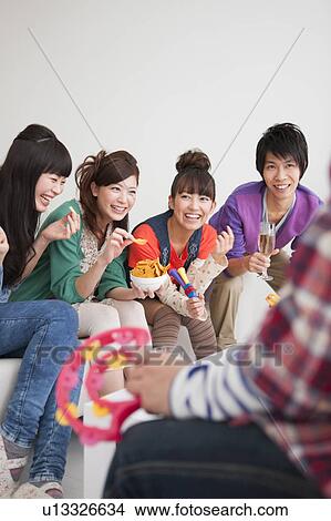 Young people chatting View Large Photo Image Picture - Young people chatting. Fotosearch