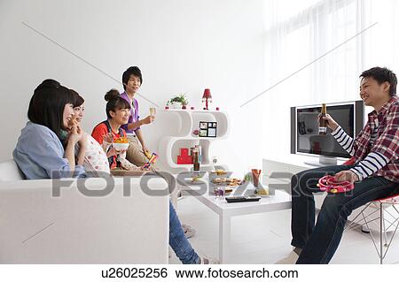 Young people chatting View Large Photo Image Stock Photograph - Young people chatting. Fotosearch