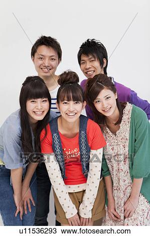Young people smiling View Large Photo Image Stock Image - Young people smiling. Fotosearch