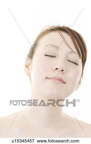 Stock Photo - Young Woman Eyes Closed. Fotosearch
