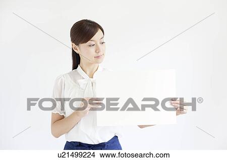 Young Woman Holding Up Blank Message View Large Photo Image Picture - Young Woman Holding Up Blank Message. Fotosearch