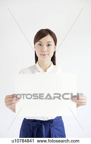 Young Woman Holding Up Blank Message View Large Photo Image Stock Image - Young Woman Holding Up Blank Message. Fotosearch