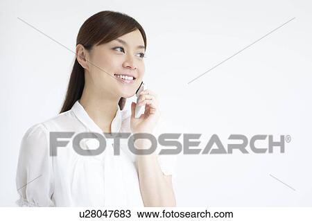 Young Woman On The Phone View Large Photo Image Stock Image - Young Woman On The Phone. Fotosearch