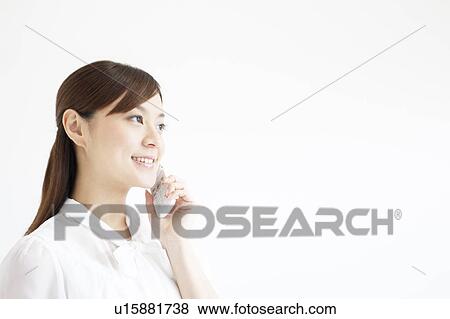 Stock Photo - Young Woman On The Phone. Fotosearch