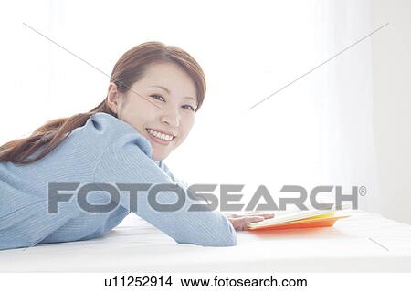 Young Woman Reading Book View Large Photo Image Picture - Young Woman Reading Book. Fotosearch