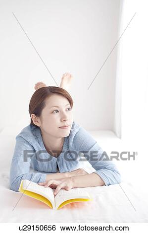 Young Woman Reading Book View Large Photo Image Stock Photograph - Young Woman Reading Book. Fotosearch