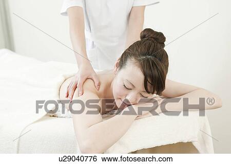 Young Woman Receiving Massaging View Large Photo Image Stock Photograph - Young Woman Receiving Massaging. Fotosearch