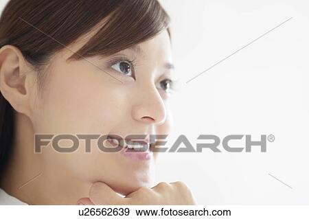 Stock Photo - Young Woman Smiling. Fotosearch