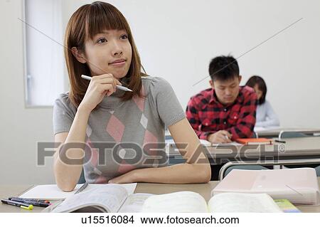 Picture - Young Woman Taking a Class. Fotosearch