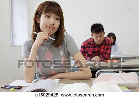 Young Woman Taking a Class View Large Photo Image Stock Photo - Young Woman Taking a Class. Fotosearch